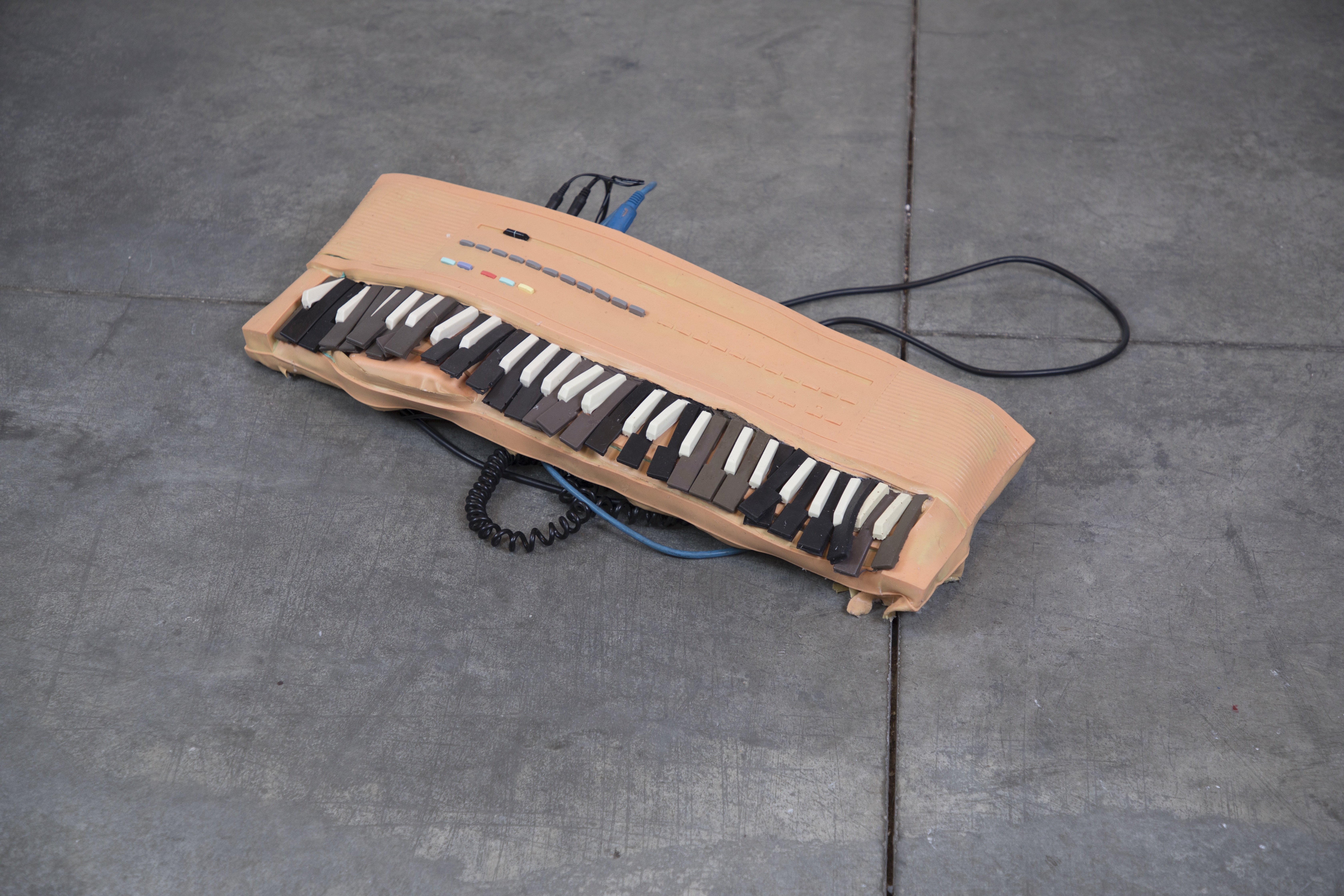Sculpture 'Organ' by Nevada Hardman. A silicone keyboard-like form exploring digital and organic hybridization. 2024