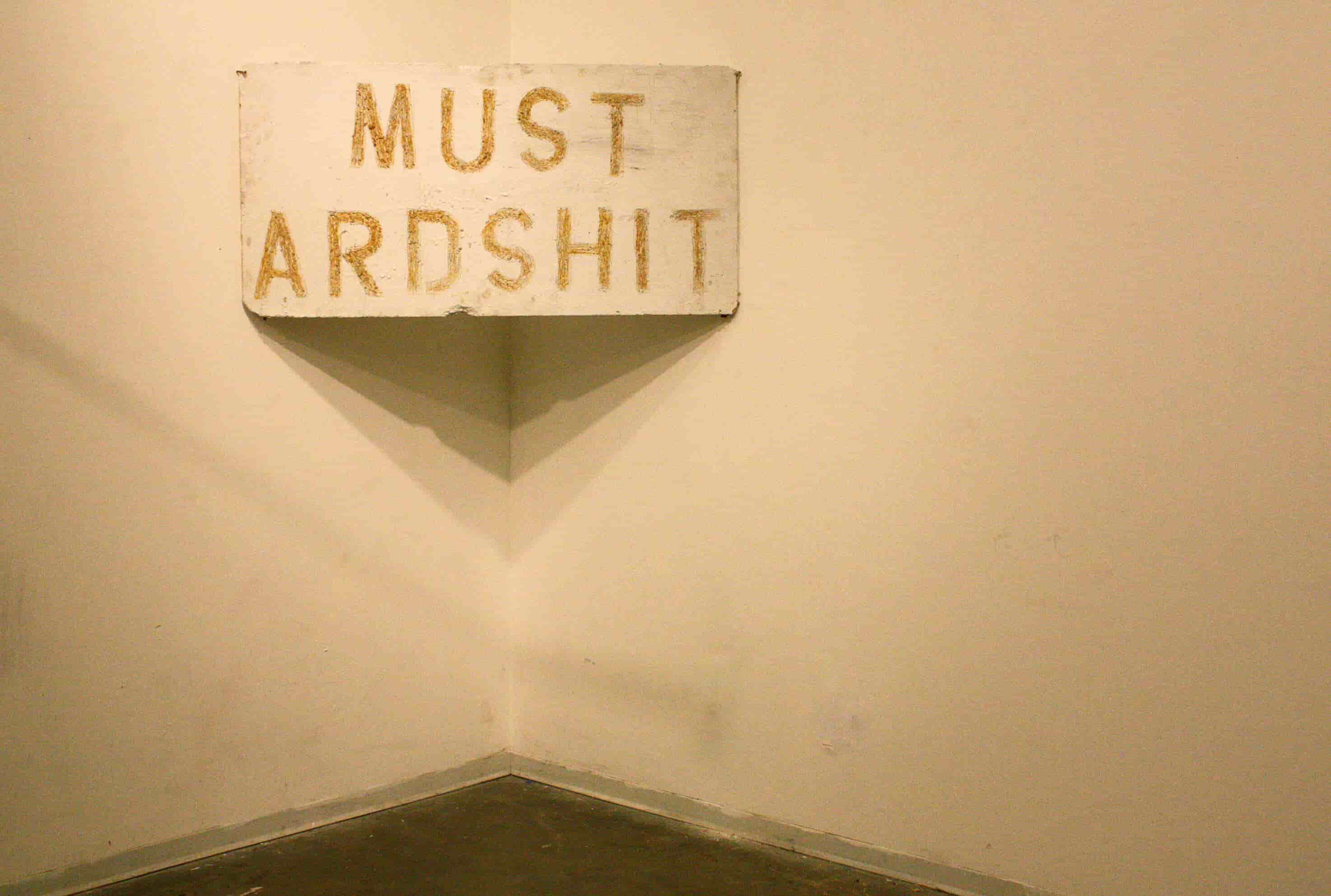 Painting 'Mustardshit' by Nevada Hardman. Mustard applied on enamel to create a visceral, organic texture.