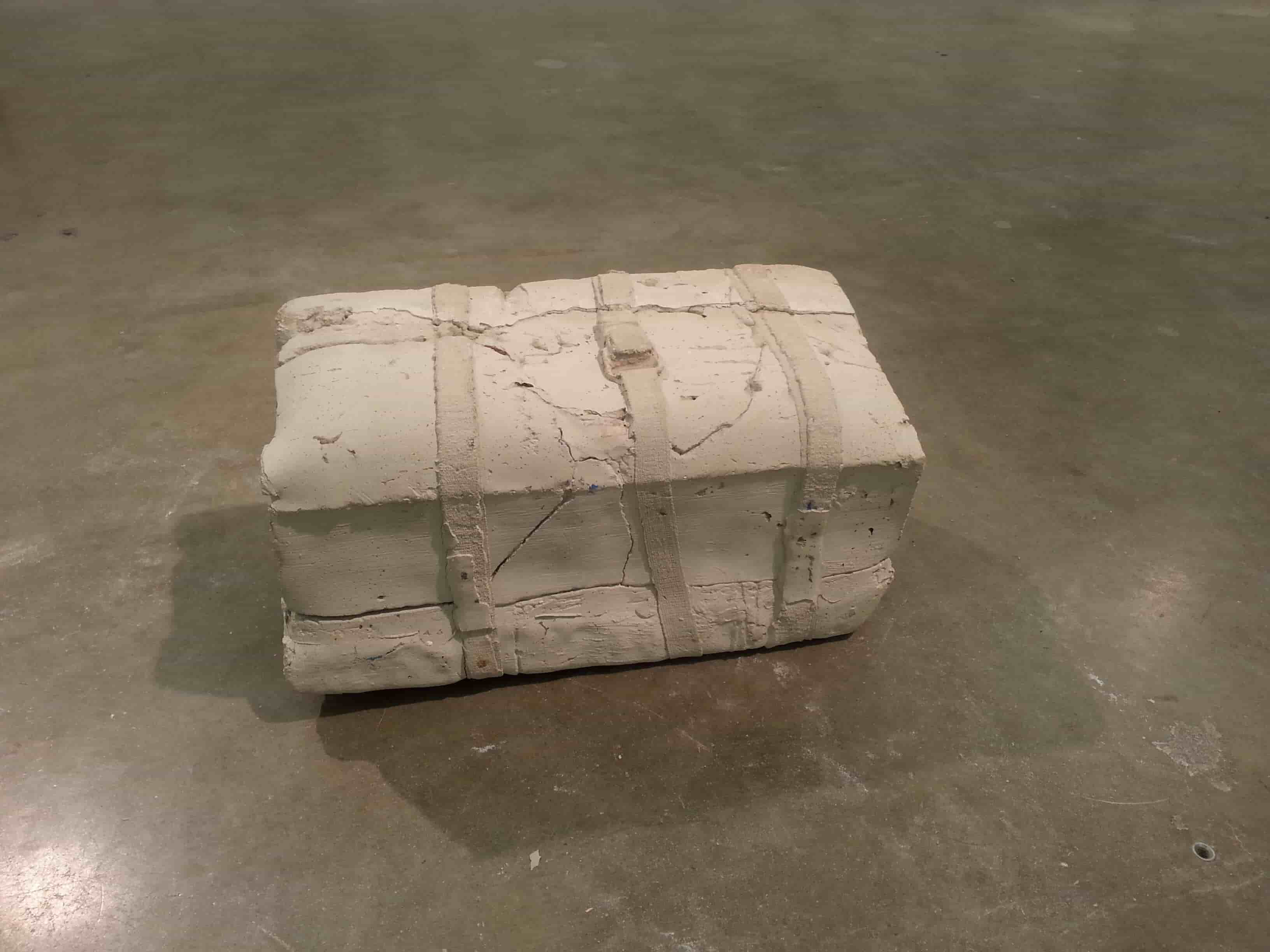 Concrete sculpture 'Blue Anvil' by Nevada Hardman. A mold of a mold cast in cement, it explores labor and new materialism